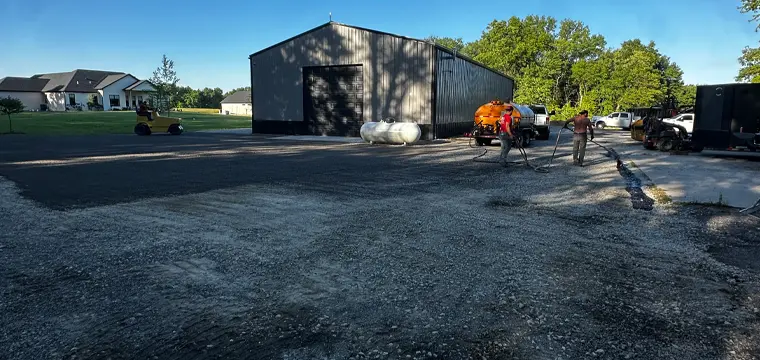 Working on Chip Seal and Tar Project
